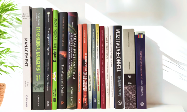 Photograph of new arrivals at CEK Library arranged on a shelf