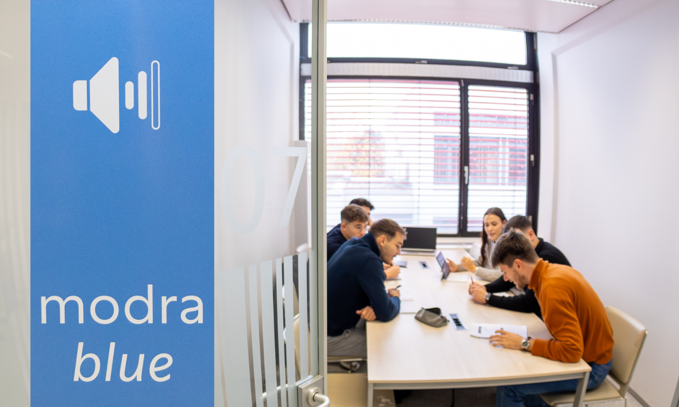 A group of students studying at the Cube of Knowledge in Blue*CEK