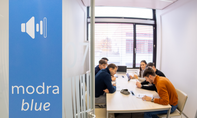 A group of students studying at the Cube of Knowledge in Blue*CEK