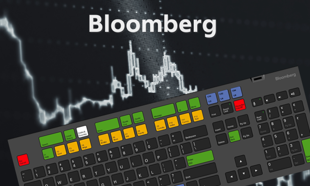 Bloomber tipkovnica z grafom in napisom Bloomberg v ozadju. 