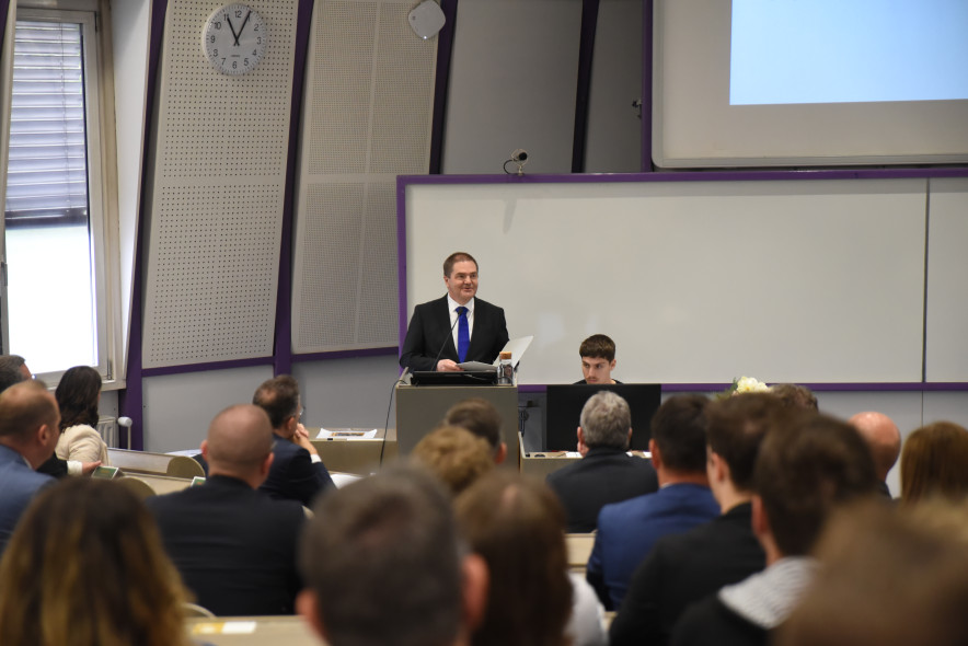 Dean of UL SEB, Prof. Tomaž Turk at the lectern in the Lila Hall. 