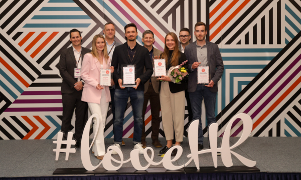 Lovehhr Awards 2026 logo displayed prominently, celebrating achievements in the industry with a festive backdrop.